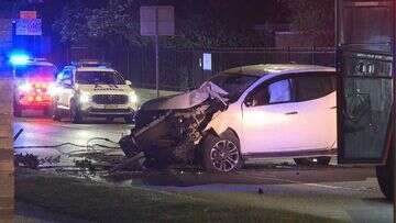 Allegedly drunk driver escapes injury after crashing into pole in Sydney