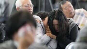 Families of victims of South Korean plane crash visit site for a memorial service