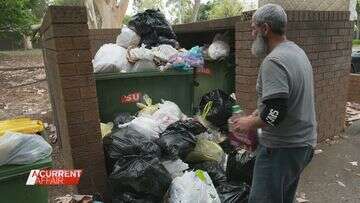 Council claims public housing block's bins are too full to empty