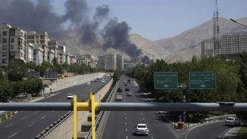 Live: Israel says it killed a top Iranian general as Trump warns people to flee