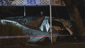 Gunshot man fighting for life after Melbourne car crash