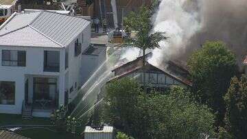 Fire engulfs house in Sydney's north