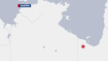 Mystery after man found dead in outback river