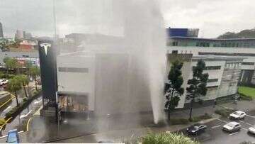 Burst water main sends water sky-high in Brisbane as state cops soaking