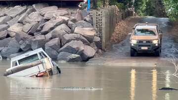 Ute stranded in croc-infested water after NT river crossing goes wrong