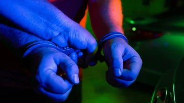 Two men charged after shooting in Brisbane's south-east, female offender still at large