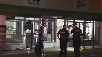 Adelaide barber's shop sprayed with bullets in drive-by shooting