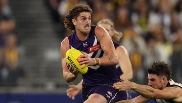 'Unstoppable' star sparks 'purple avalanche' to famous win