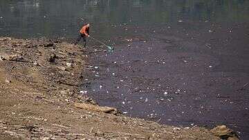 The once-stunning lake now inundated with tonnes of waste