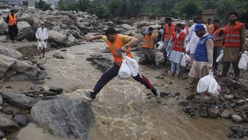 Pakistan defends flood response after more than 270 people killed