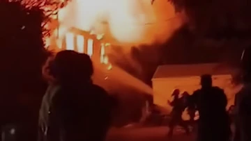 Grim discovery after raging inferno destroys Queensland backpacker hostel