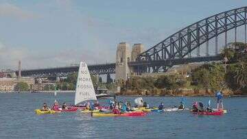 Protesters take to Sydney Harbour as power debate continues