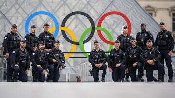 Crowds build in Paris for Olympics opening ceremony