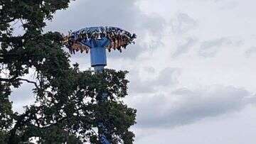 Crews rescue 30 people trapped upside down high on US amusement park ride