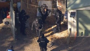 Two charged with weapons, drugs offences after police raid rural properties