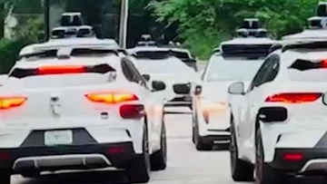 Confused driverless taxis take over streets in American suburb