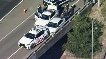 Young woman charged over plotting to kill top crime gang figure