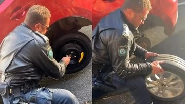 'Awesome community spirit' :Cop helps change tyre on busy highway
