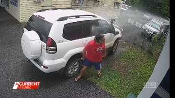 Business owner gives cars a hosing down for parking in his driveway