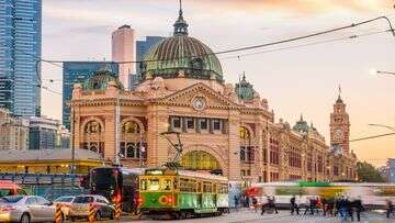 Man arrested after group of masked neo-Nazis storm Melbourne CBD