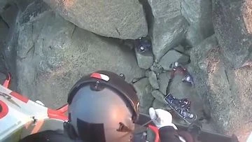 Death-defying rescue after climber falls eight metres on remote peak