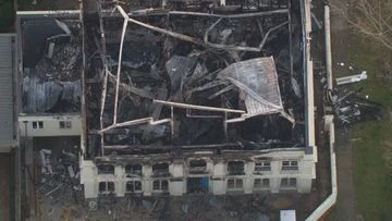 Police investigate after blaze guts mansion in affluent Melbourne suburb