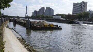 Seine River still has unsafe E. coli levels with Paris Olympics less than a month away