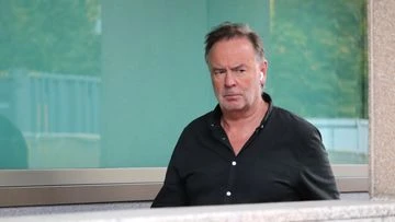 Judge accused of jealous rage after tracking woman via earphones