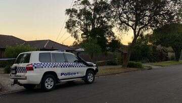 Woman charged with murder after body found inside Melbourne home