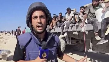 Mourners call to protect journalists after Israel's 'targeted assassination'