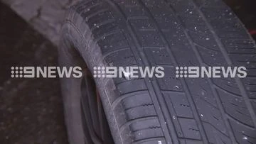 Major highway shut after truck debris shreds tyres of dozens of cars