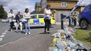 British police arrest man on suspicion of crossbow murders
