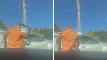 Man smashes car with machete in Sydney road rage