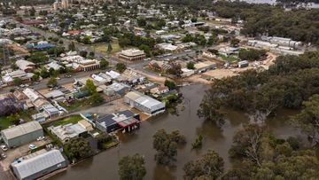 BoM defends warning after town was flooded just after forecast