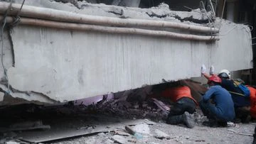 More than 90 students remain buried in rubble two days after school collapse in Indonesia