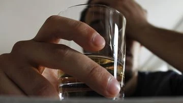 Why millions of middle-aged Aussie men are driven to drink