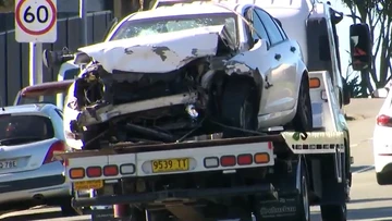 Man, 19, arrested after crash that killed woman and unborn child