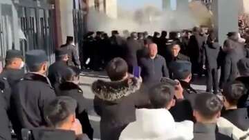 Protests turn violent in China after student falls to his death