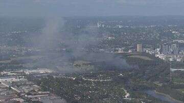 Fire crews tackle bushfire near Sydney Olympic Park