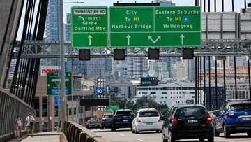 Investigation after pair die from fall from major Sydney CBD overpass