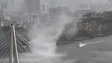 Incredible moment gustnado rips through Brisbane River during wild storm