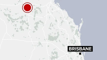 Man airlifted to hospital after getting trapped under grain silo in Queensland