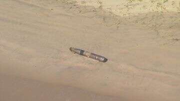 Suspected torpedo washes up on Gold Coast beach