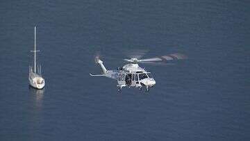 Man trapped in car after crash on Sydney bridge