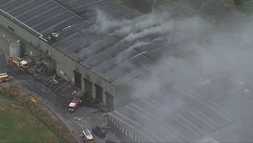 More than 100 firefighters battle blaze at rubbish tip in Sydney's south-west