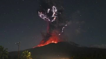 Indonesian volcano erupts again, spewing giant ash plumes miles away