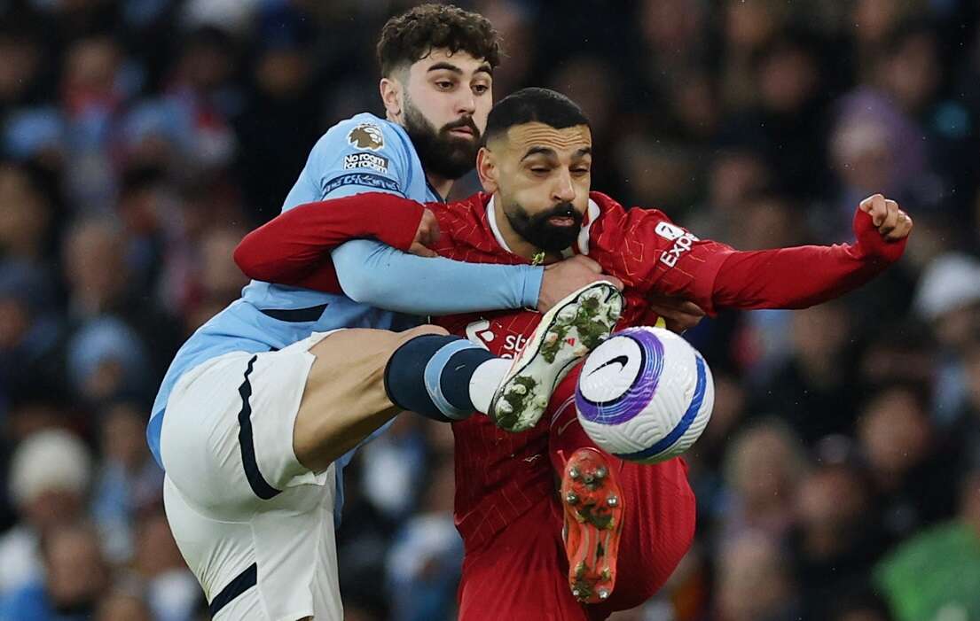 Liverpool beat Man City 2-0 to extend lead at top to 11 points