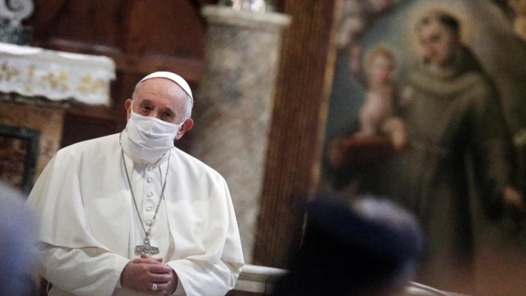 Pope wears mask for first time at public event