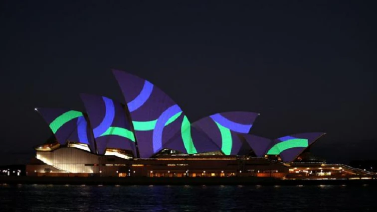 Sydney Opera House lit with poppies for Remembrance Day