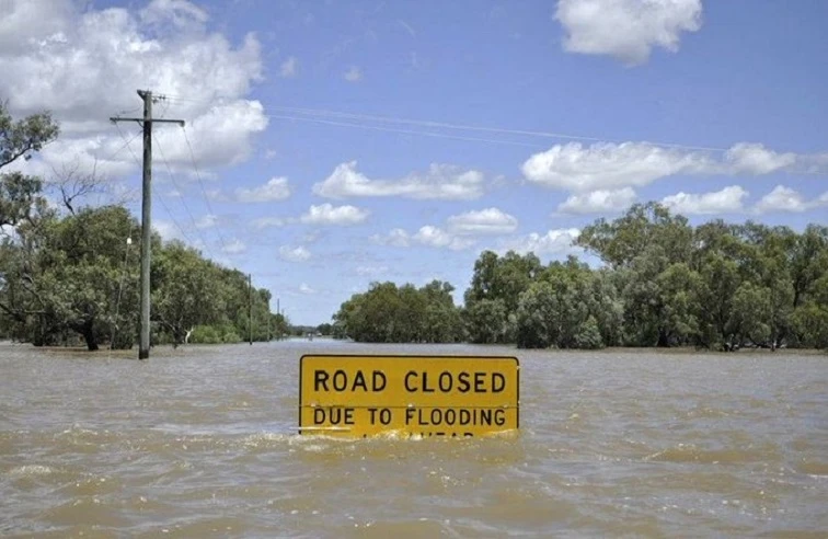 Police divers save trapped motorists in flood-hit North West